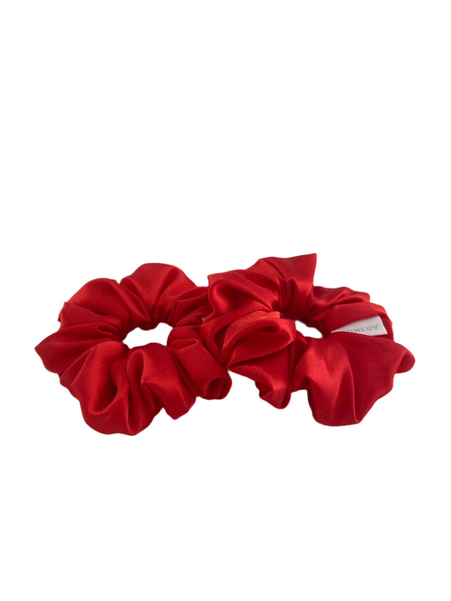Two Red BUNLUV SmartCore scrunchies in premium satin