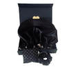 Black satin hair bonnet with matching scrunchie and bow on a white background