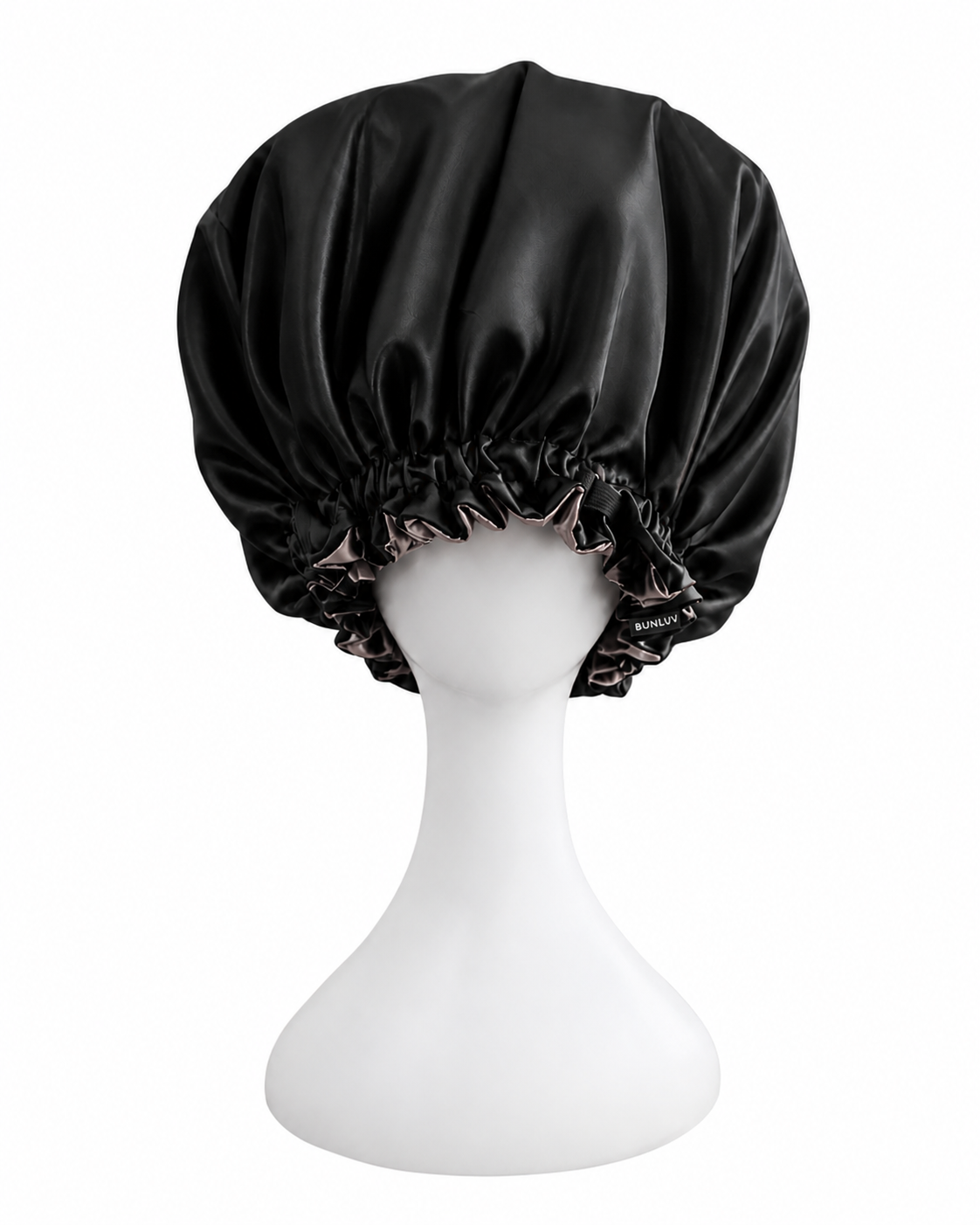 black and rose gold satin sleep bonnet on mannequin white background