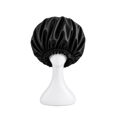 Black satin sleep bonnet by BUNLUV on white background