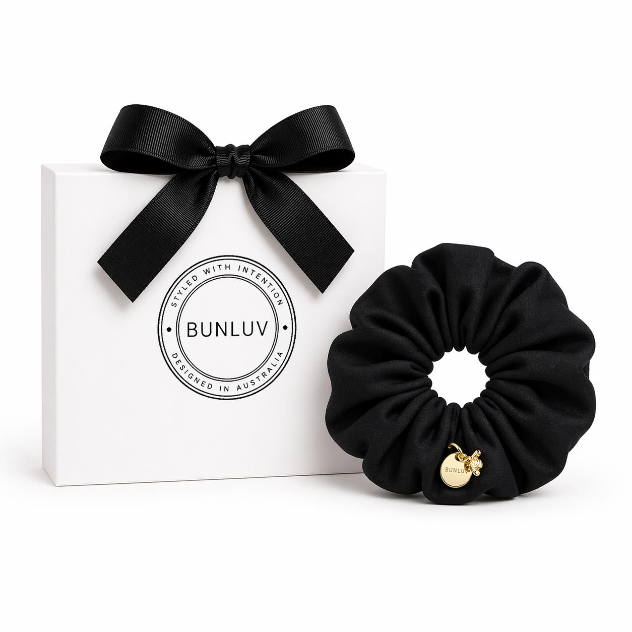 Black mulberry silk scrunchie with gold charm by BUNLUV, shown with gift box