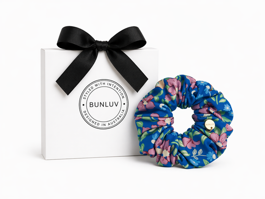 Blue floral swim scrunchie by BUNLUV, shown with gift box