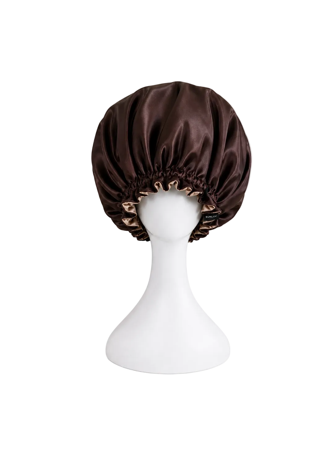 Dark chocolate rose gold satin bonnet on a white mannequin head against a white background