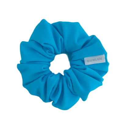 BUNLUV swim scrunchie in light blue, designed for wet hair and swimming