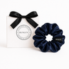 Navy satin scrunchie by BUNLUV, shown with gift box