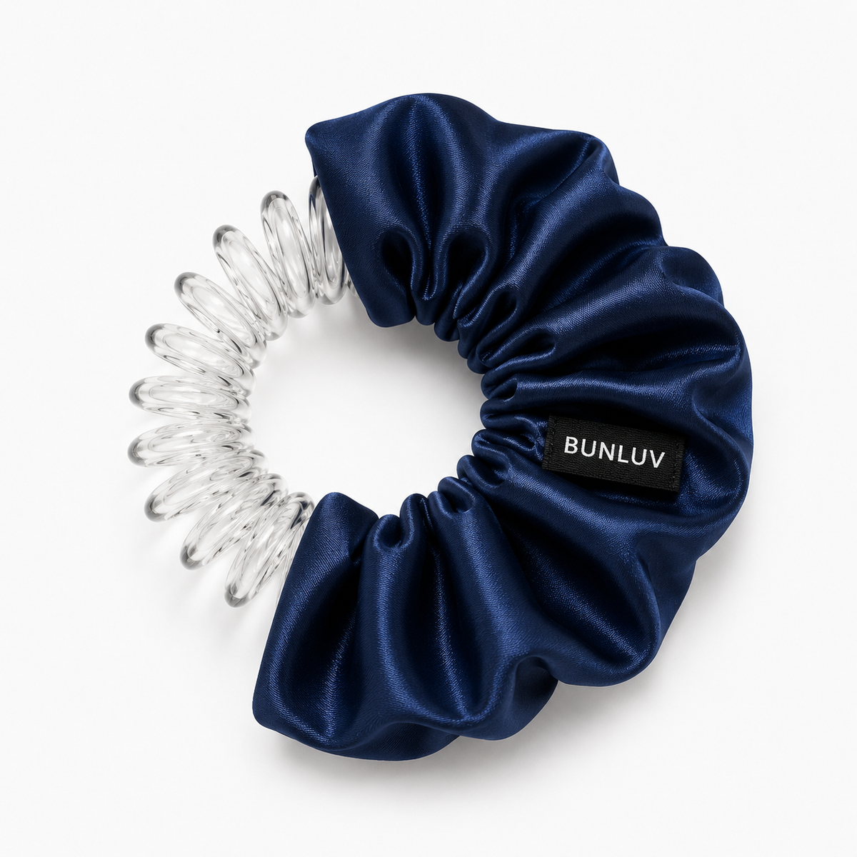 satin navy scrunchie with clear spiral design on a white background, by BUNLUV