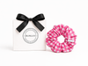 Pink gingham swim scrunchie by BUNLUV, shown with gift box