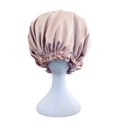 Pink satin sleep bonnet by BUNLUV on white background