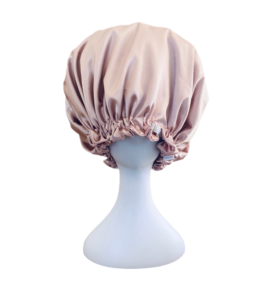 Pink satin sleep bonnet by BUNLUV on white background