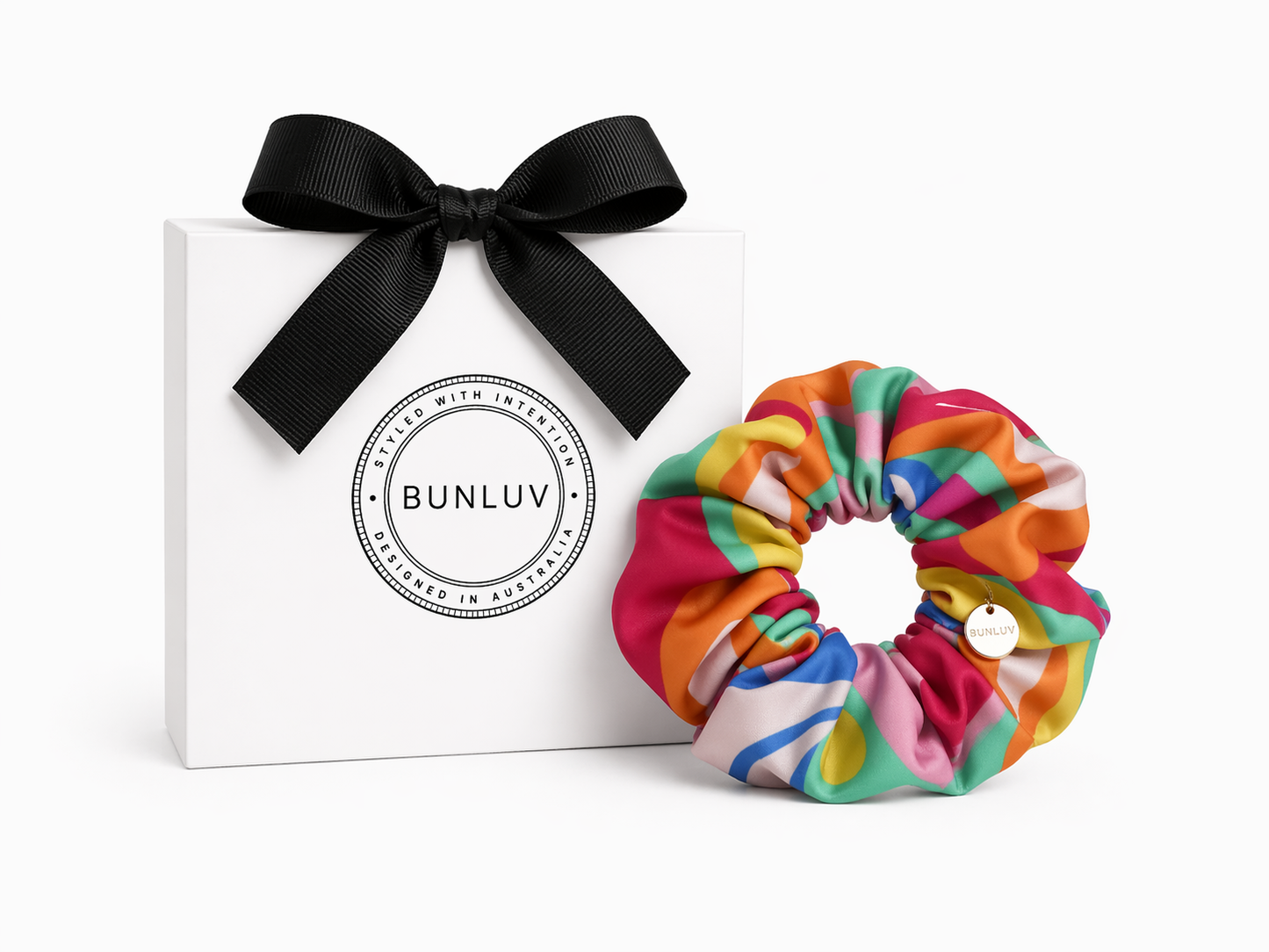 Rainbow swim scrunchie by BUNLUV, shown with gift box