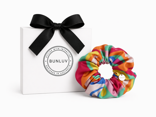 Rainbow swim scrunchie by BUNLUV, shown with gift box