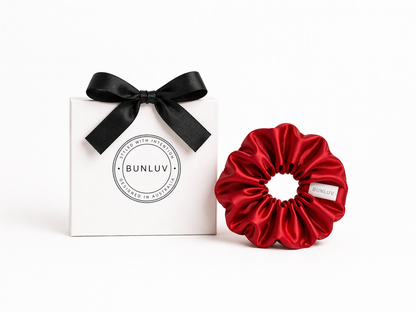 Red satin scrunchie by BUNLUV, shown with gift box