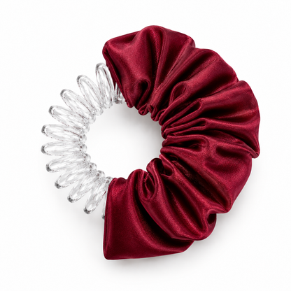 school maroon scrunchie with clear spiral design on a white background, by BUNLUV