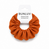 Orange school smartcore spiral scrunchie with 'BUNLUV' packaging on a white background