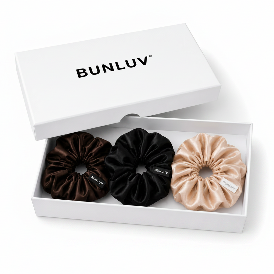 Three BUNLUV smartcore spiral scrunchies black, dark chocolate and nude in a white box with 'BUNLUV' branding 